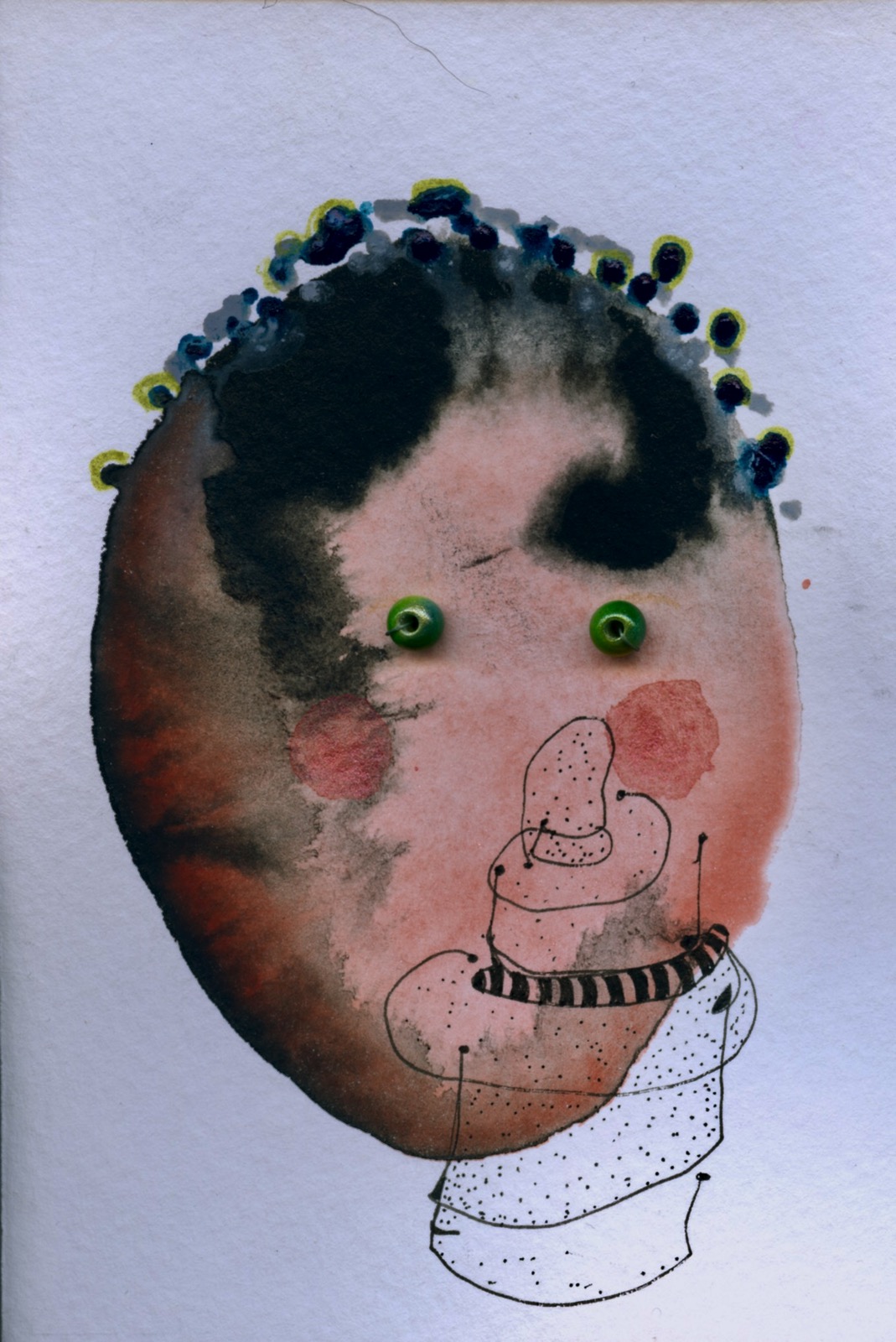 Empty ink bottle, beads and ink blob